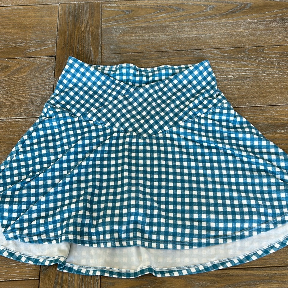 White and blue checkered skirt with built in shorts